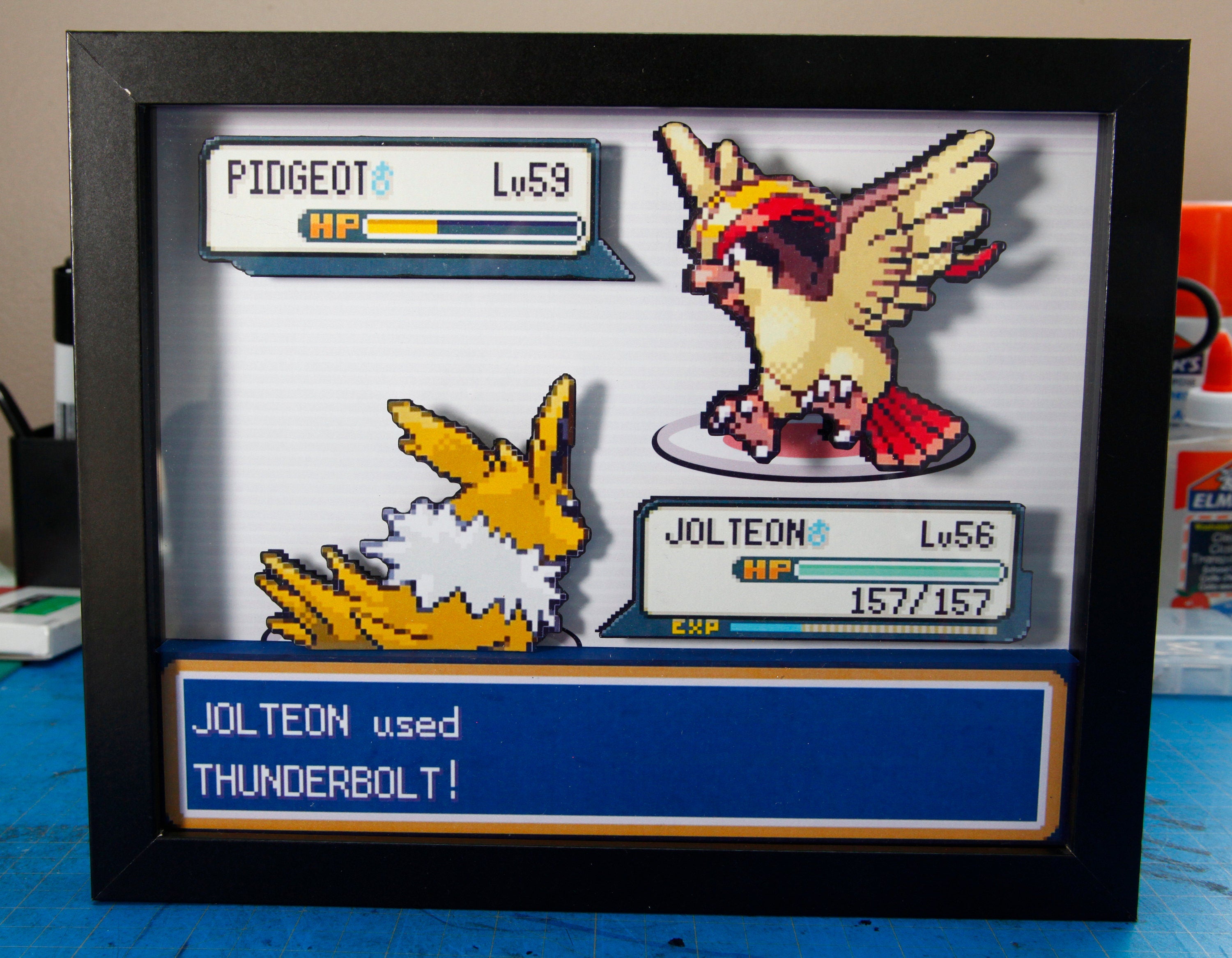 Pokemon Jolteon vs. Pidgeot 3d shadow box diorama
