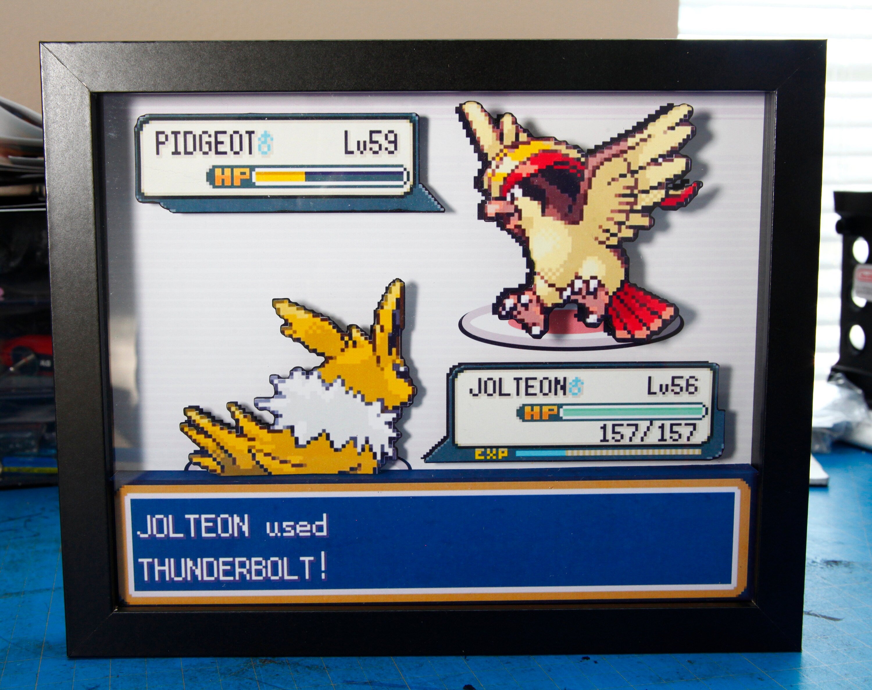 Pokemon Jolteon vs. Pidgeot 3d shadow box diorama