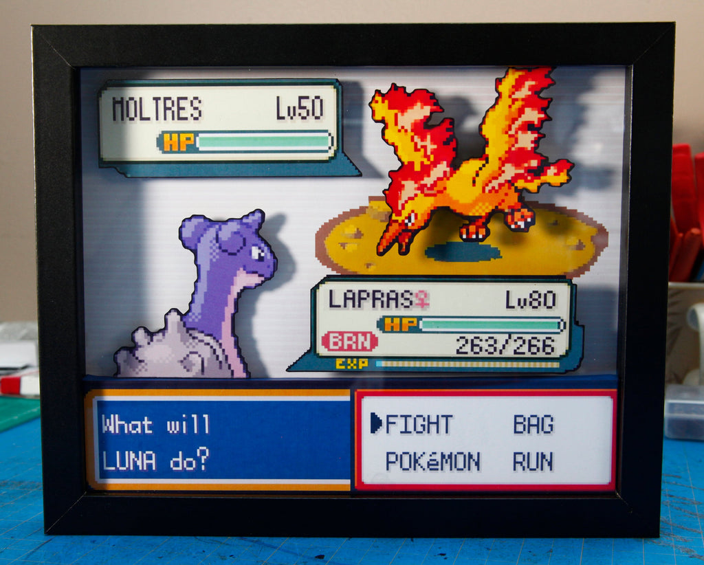 Pokemon Lapras vs. Moltres 3d shadow box diorama