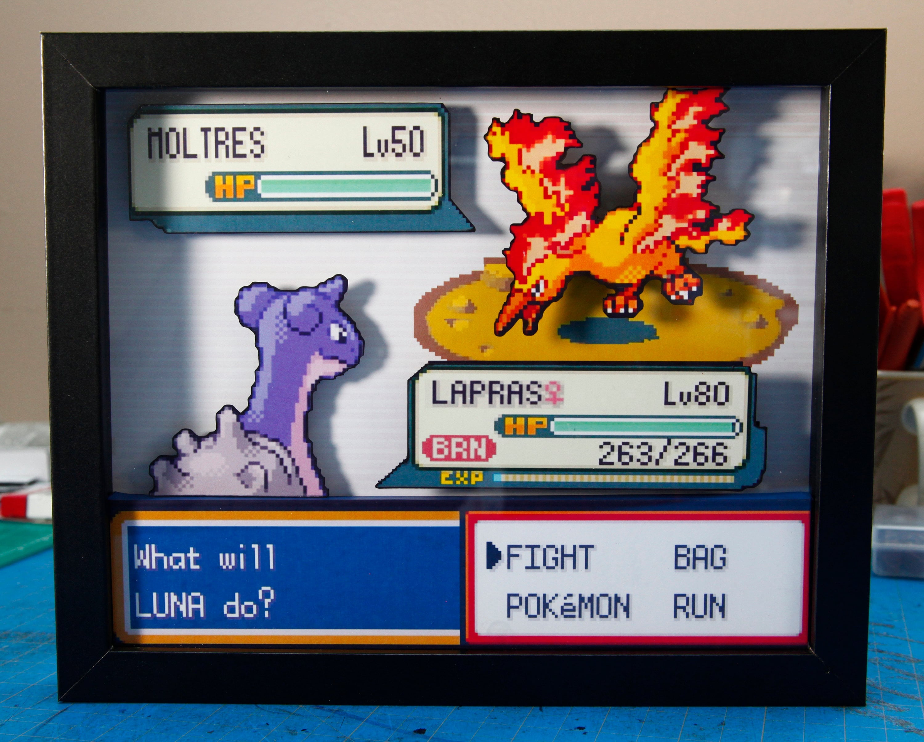 Pokemon Lapras vs. Moltres 3d shadow box diorama