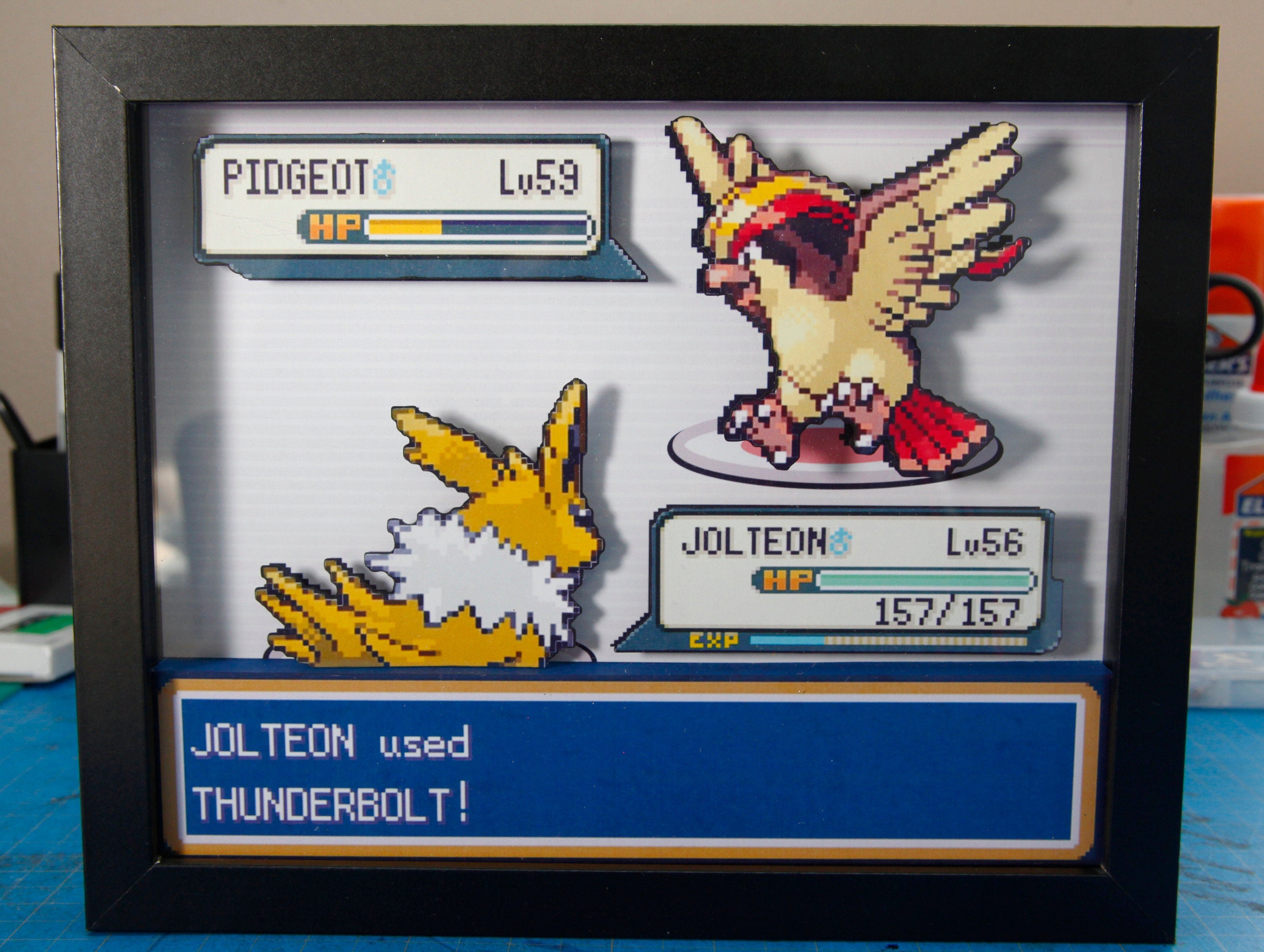 Pokemon Jolteon vs. Pidgeot 3d shadow box diorama