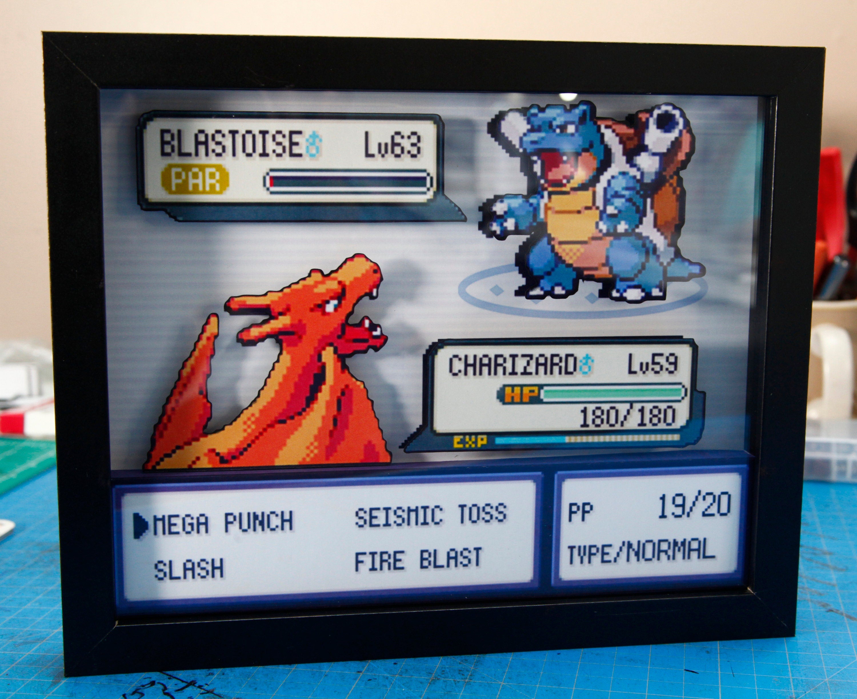 Pokemon Charizard vs. Blastoise 3d shadow box diorama