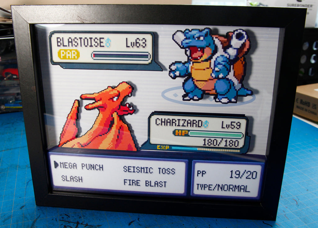 Pokemon Charizard vs. Blastoise 3d shadow box diorama