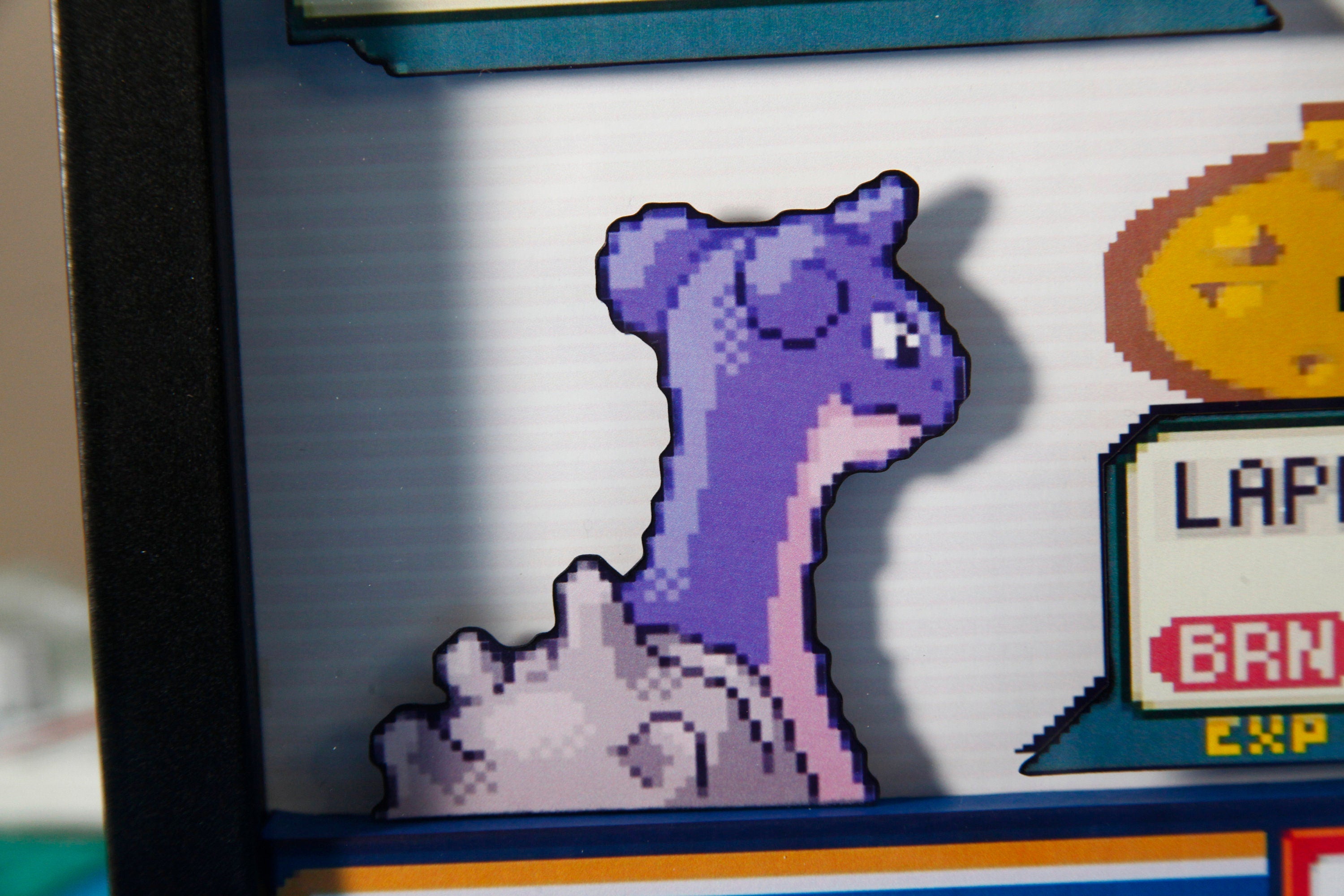 Pokemon Lapras vs. Moltres 3d shadow box diorama