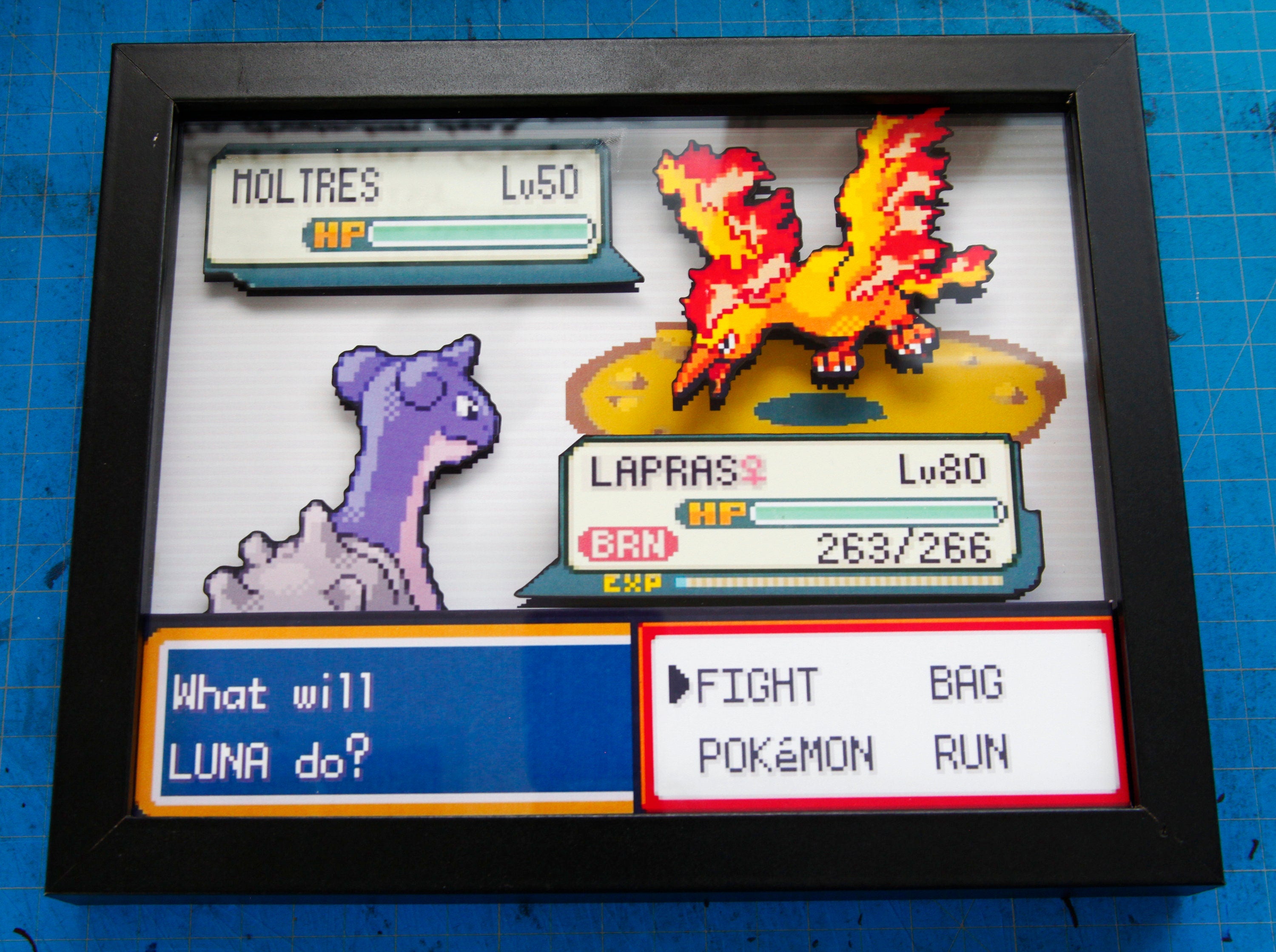 Pokemon Lapras vs. Moltres 3d shadow box diorama