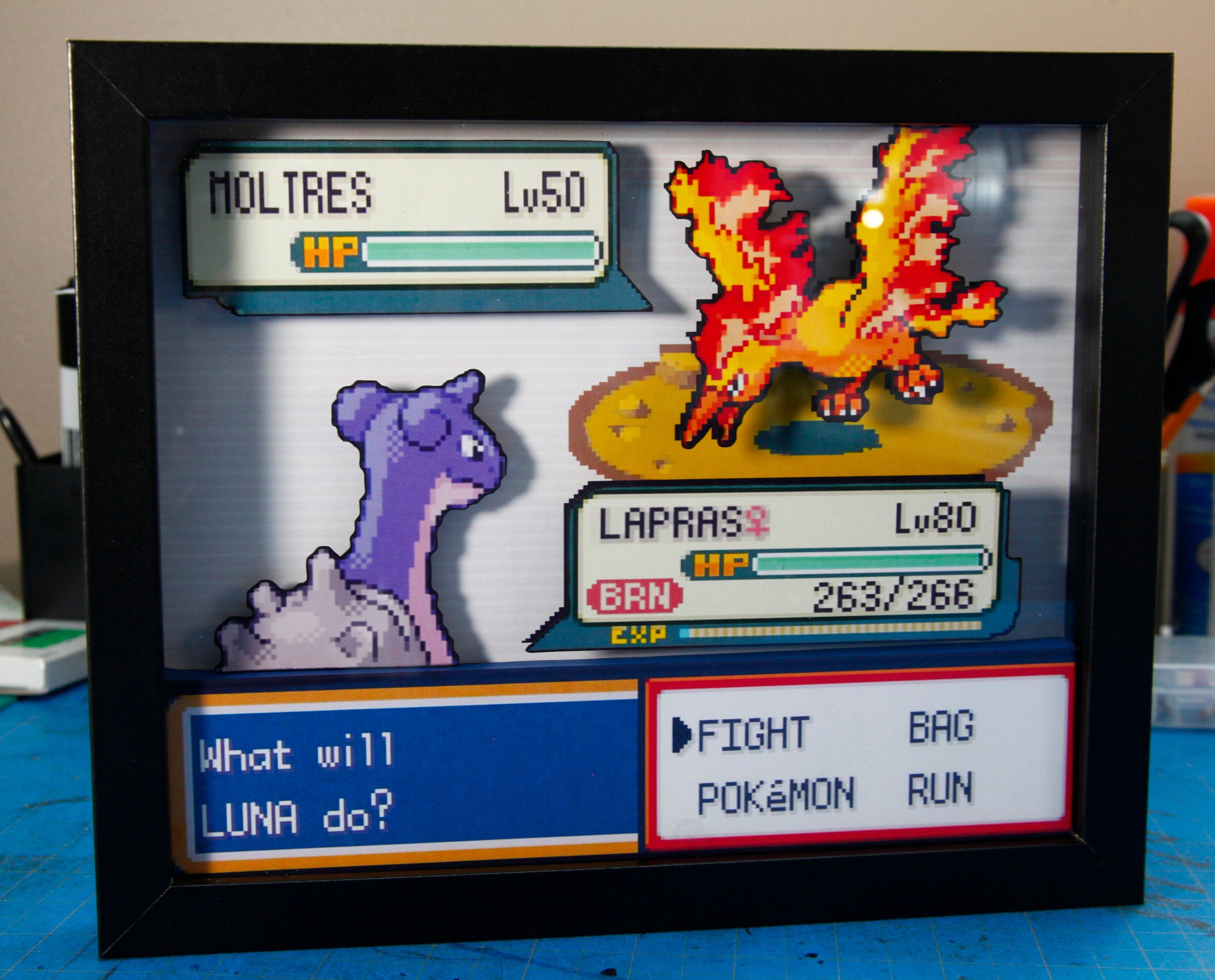 Pokemon Lapras vs. Moltres 3d shadow box diorama
